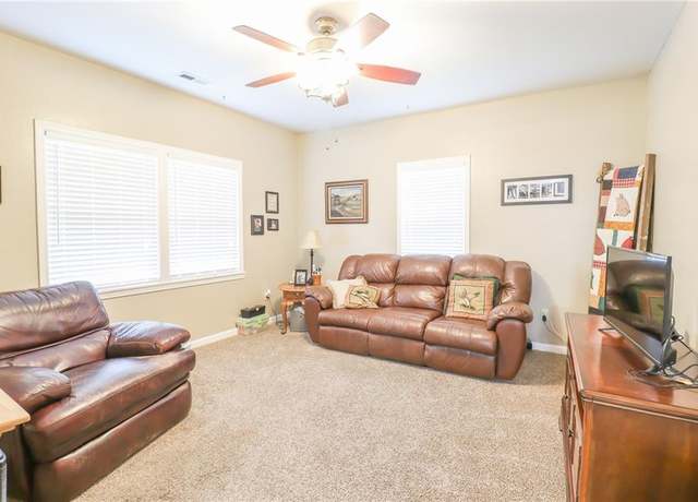 Property at 1404 S Market St, Holden, MO 64040, 4 beds, 2 baths