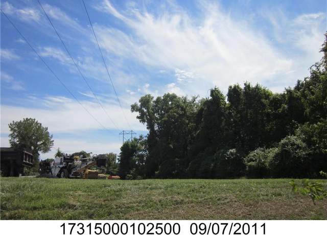 Property at 1409 NE Russell Rd, Kansas City, MO 64116