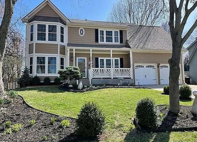 Property at 11328 S Rene St, Olathe, KS 66215, 4 beds, 2.5 baths