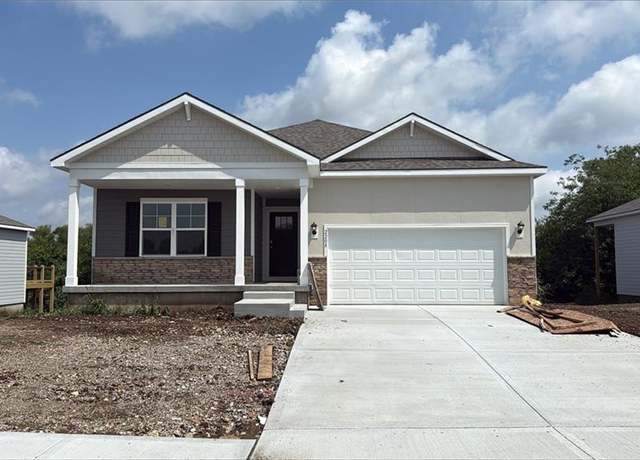 Property at 2208 Creek View Ln, Raymore, MO 64083, 3 beds, 2 baths