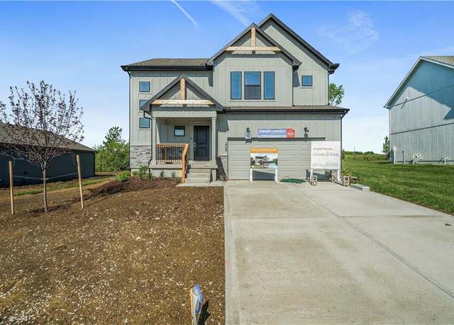 Property at 408 Woodview Dr, Raymore, MO 64083, 4 beds, 2.5 baths
