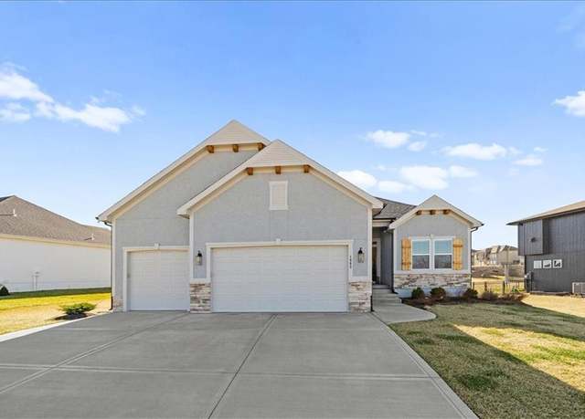 Property at 1003 Bridgeshire Dr, Raymore, MO 64083, 4 beds, 3 baths