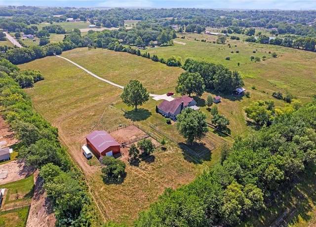 Property at 1116 N Madison St, Raymore, MO 64083, 4 beds, 3.5 baths