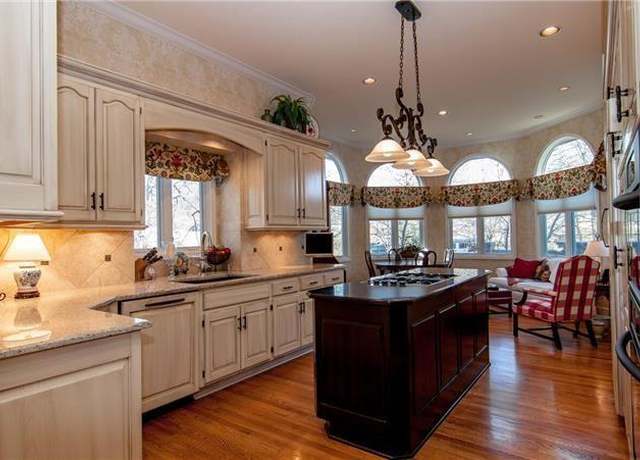 Property at 12428 Linden St, Leawood, KS 66209, 3 beds, 3.5 baths