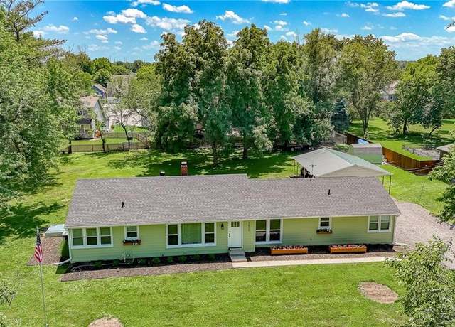 Property at 2633 E Langsford Rd, Lee's Summit, MO 64063, 4 beds, 2 baths