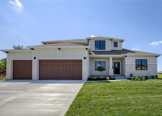 Property at 902 Reed Dr, Raymore, MO 64083, 4 beds, 3.5 baths