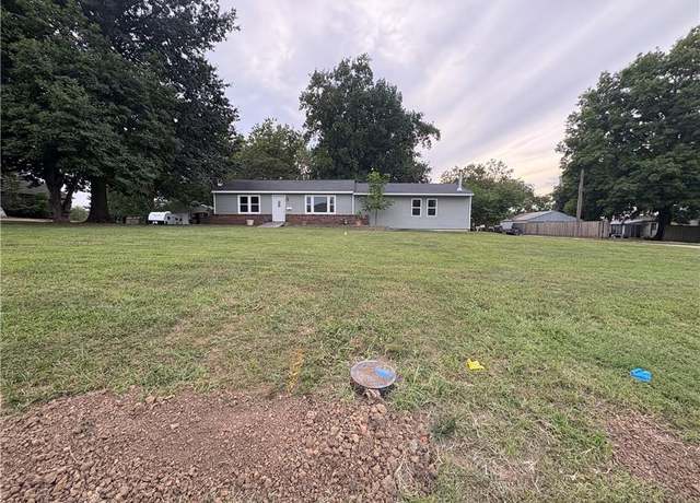 Property at 309 N 4th St, Odessa, MO 64076, 4 beds, 2 baths