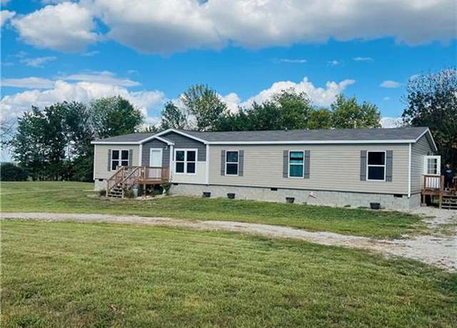 Property at 817 SW 891st Rd, Holden, MO 64040, 4 beds, 3 baths