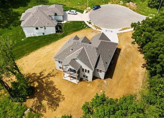 Property at 7007 N Kirkwood Ave, Kansas City, MO 64151, 4 beds, 3 baths