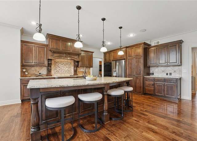 Property at 9332 W 158th St, Overland Park, KS 66221, 6 beds, 6 baths