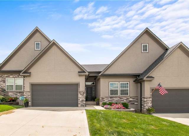 Property at 807 NE Algonquin St Unit B, Lee's Summit, MO 64064, 3 beds, 3 baths