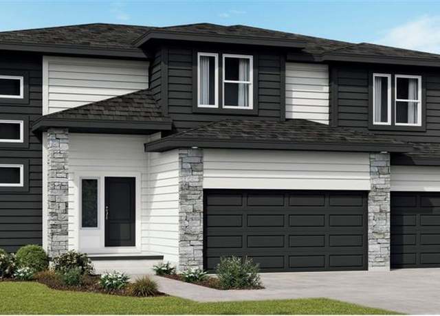 Property at 409 Woodview Dr, Raymore, MO 64083, 4 beds, 3.5 baths