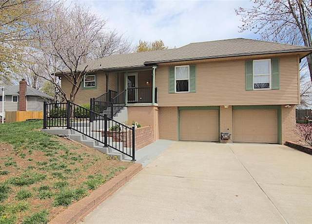 Property at 225 N Woodson Dr, Raymore, MO 64083, 3 beds, 3 baths