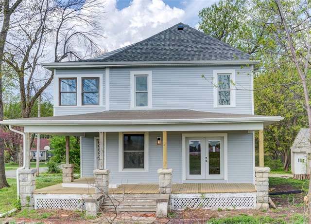 Property at 611 E 8th St, Wellsville, KS 66092, 4 beds, 3 baths