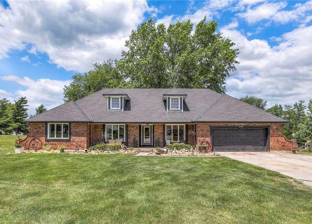 Property at 400 Appaloosa Dr, Raymore, MO 64083, 4 beds, 3 baths