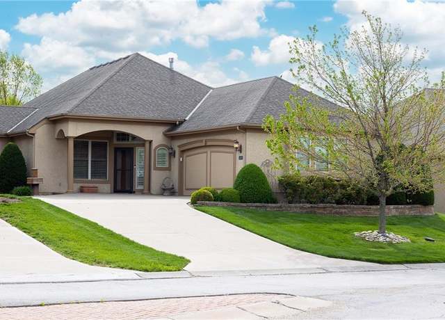 Property at 1649 NE Woodland Shores Cir, Lee's Summit, MO 64086, 3 beds, 3 baths