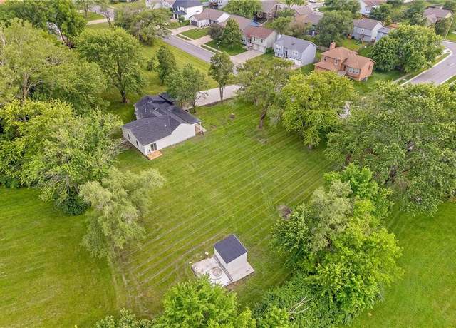 Property at 11307 N Nashua Dr, Kansas City, MO 64155, 4 beds, 2 baths