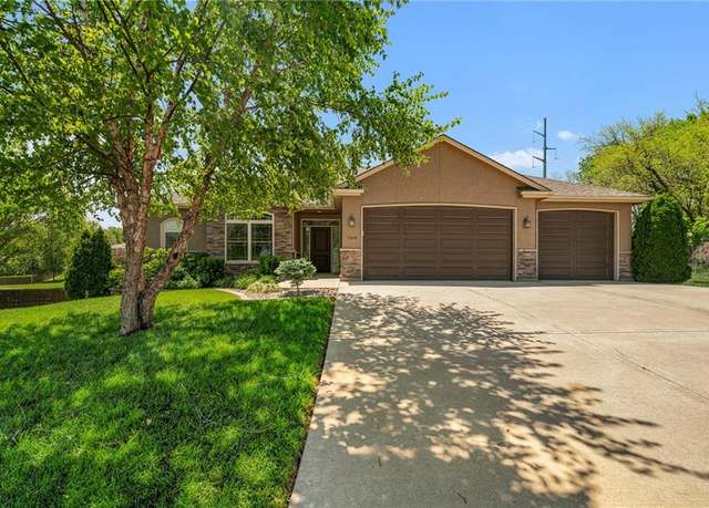 Property at 704 Meadowlark St SE, Blue Springs, MO 64014, 4 beds, 3 baths