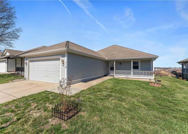 Property at 710 E Saturn Dr, Raymore, MO 64083, 2 beds, 2 baths