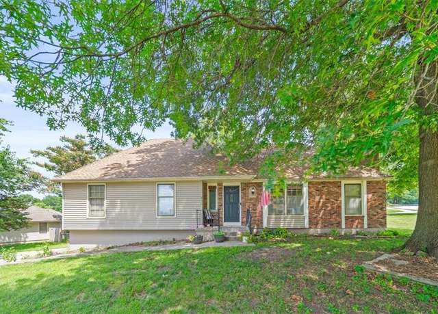 Property at 211 S Sunset Ln, Raymore, MO 64083, 4 beds, 4 baths