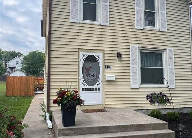 Property at 1407 Commercial St, Atchison, KS 66002, 3 beds, 1.5 baths