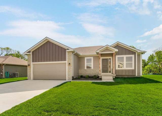 Property at 910 SW Pintail Ln, Oak Grove, MO 64075, 4 beds, 3 baths