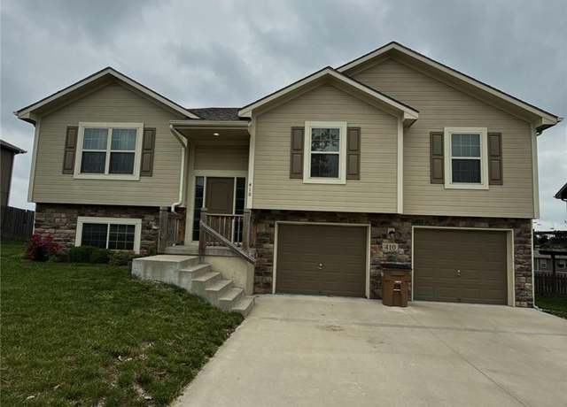 Property at 410 Heritage Dr, Raymore, MO 64083, 4 beds, 3 baths