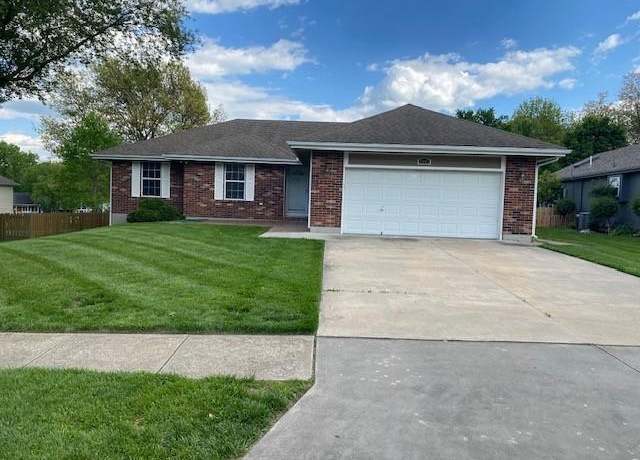 Property at 3885 SW Harbor Dr, Lee's Summit, MO 64082, 4 beds, 3 baths