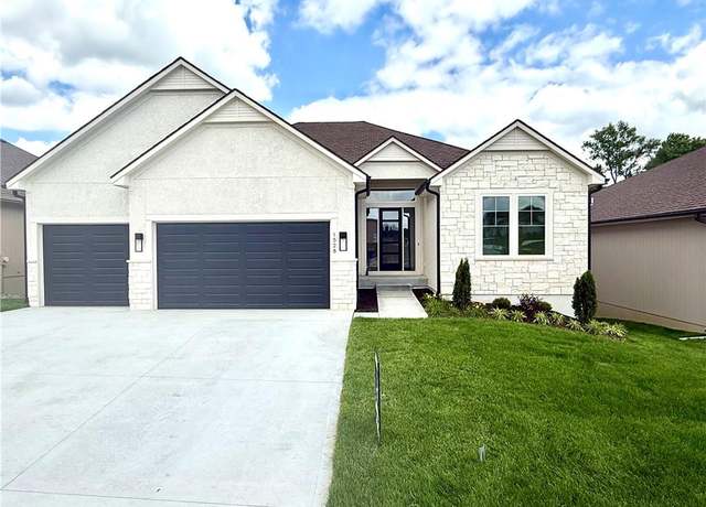 Property at 1528 NE Park Springs Dr, Lee's Summit, MO 64064, 3 beds, 3.5 baths