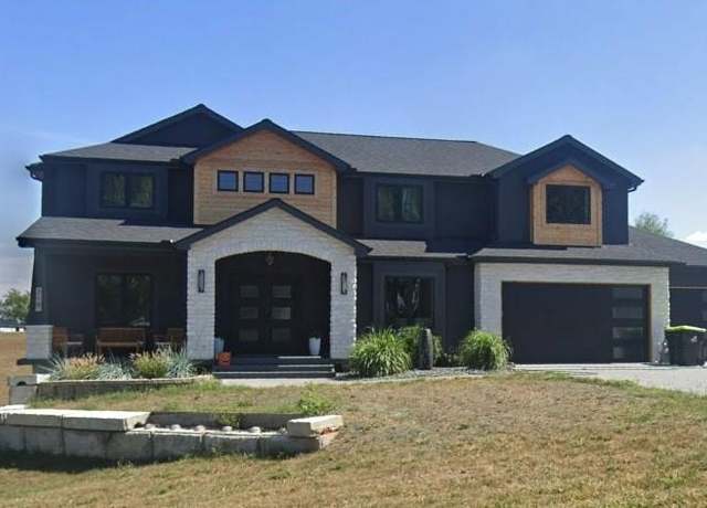 Property at 719 S Minter Rd, Grain Valley, MO 64029, 5 beds, 3.5 baths