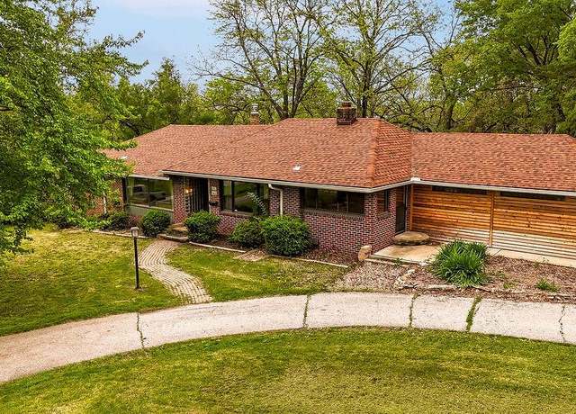 Property at 221 E 97th St, Kansas City, MO 64114, 3 beds, 2 baths