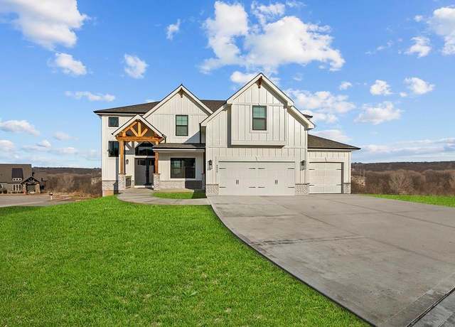 Property at 8209 NW 89th St, Kansas City, MO 64153, 4 beds, 3.5 baths