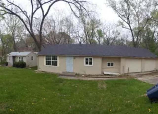 Property at 5611 Ewing Ave, Kansas City, MO 64129, 4 beds, 2 baths
