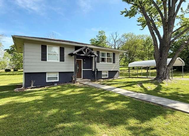Property at 801 E Thompson St, El Dorado Springs, MO 64744, 4 beds, 2 baths