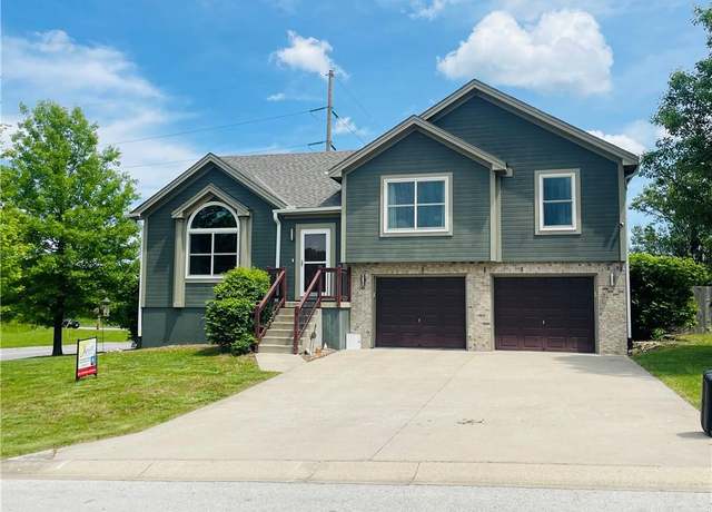 Property at 701 SW Woodland Cir, Grain Valley, MO 64029, 3 beds, 2.5 baths