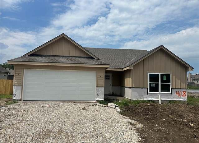 Property at 408 Ash St, Wellsville, KS 66092, 3 beds, 2 baths