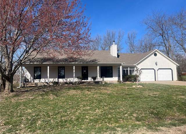 Property at 1102 S Elm St, Louisburg, KS 66053, 5 beds, 3 baths