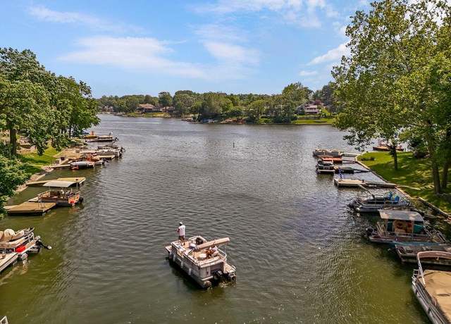 Property at 376 NW North Shore Dr, Lake Waukomis, MO 64151, 3 beds, 3 baths