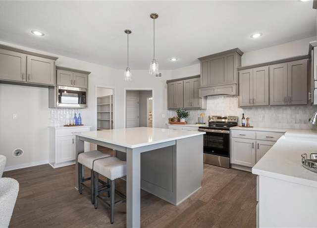 Property at 19422 W 114th Ter, Olathe, KS 66061, 5 beds, 4 baths