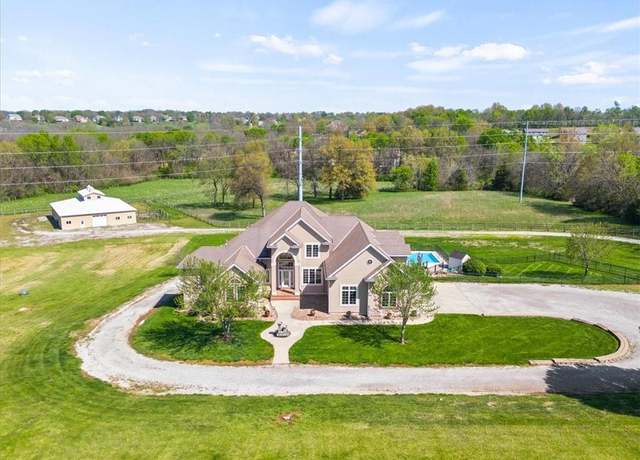 Property at 1111 N Campbell St, Pleasant Hill, MO 64080, 7 beds, 5 baths