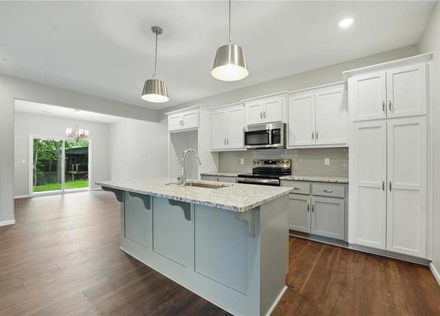 Property at 809 Highland Dr, Edwardsville, KS 66111, 3 beds, 2.5 baths