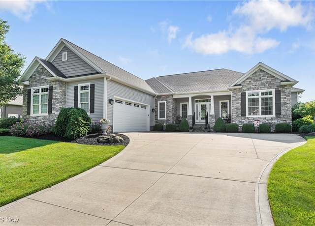 Property at 7406 Rolling Green Ave NW, Massillon, OH 44646, 3 beds, 3.5 baths