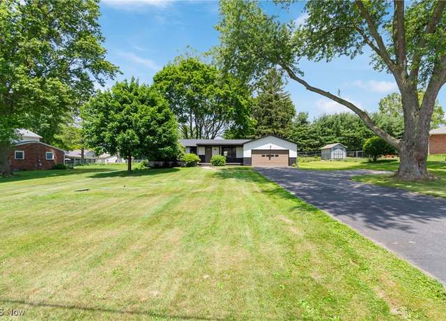 Property at 12660 Bluebell Ave NE, Hartville, OH 44632, 3 beds, 1.5 baths