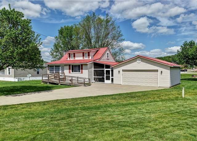 Property at 1613 Roanoke Ave, Uhrichsville, OH 44683, 2 beds, 1.5 baths