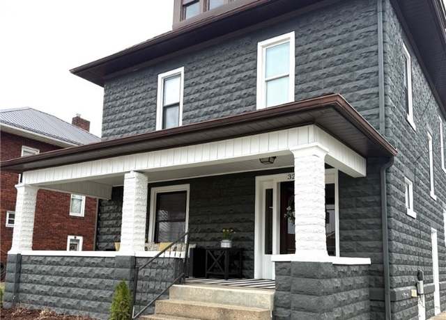 Property at 322 Commercial Ave SE, New Philadelphia, OH 44663, 3 beds, 2 baths