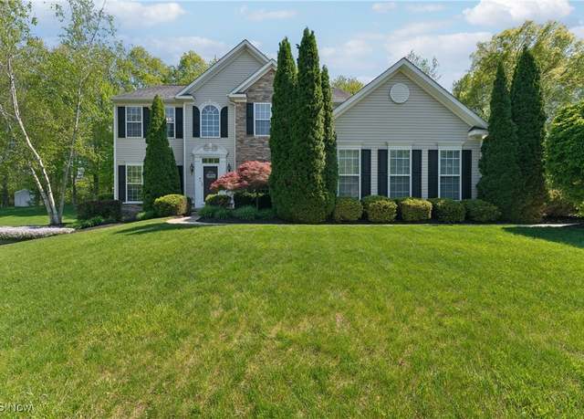 Property at 592 Amberley Dr, Uniontown, OH 44685, 4 beds, 3 baths