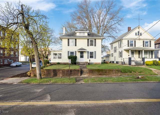 Property at 1703 Woodland Ave NW, Canton, OH 44703, 4 beds, 2 baths