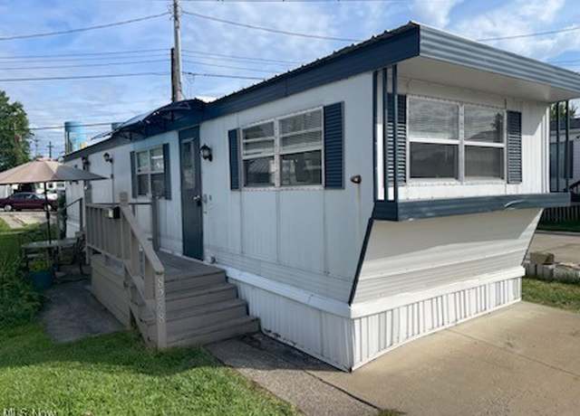 Property at 8258 Russell Ln, Cleveland, OH 44130, 2 beds, 1 bath