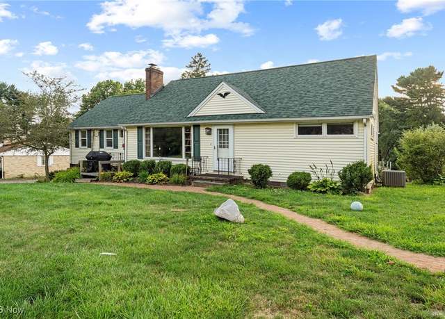 Property at 805 Woodlawn Ave NW, Canton, OH 44708, 4 beds, 3 baths