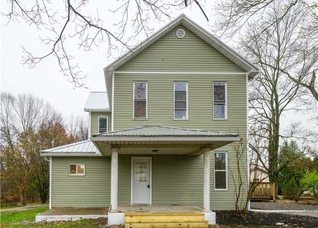 Property at 715 Newport Ave, Uhrichsville, OH 44683, 4 beds, 2 baths